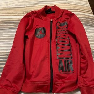 Red and black sweatshirt size {S}